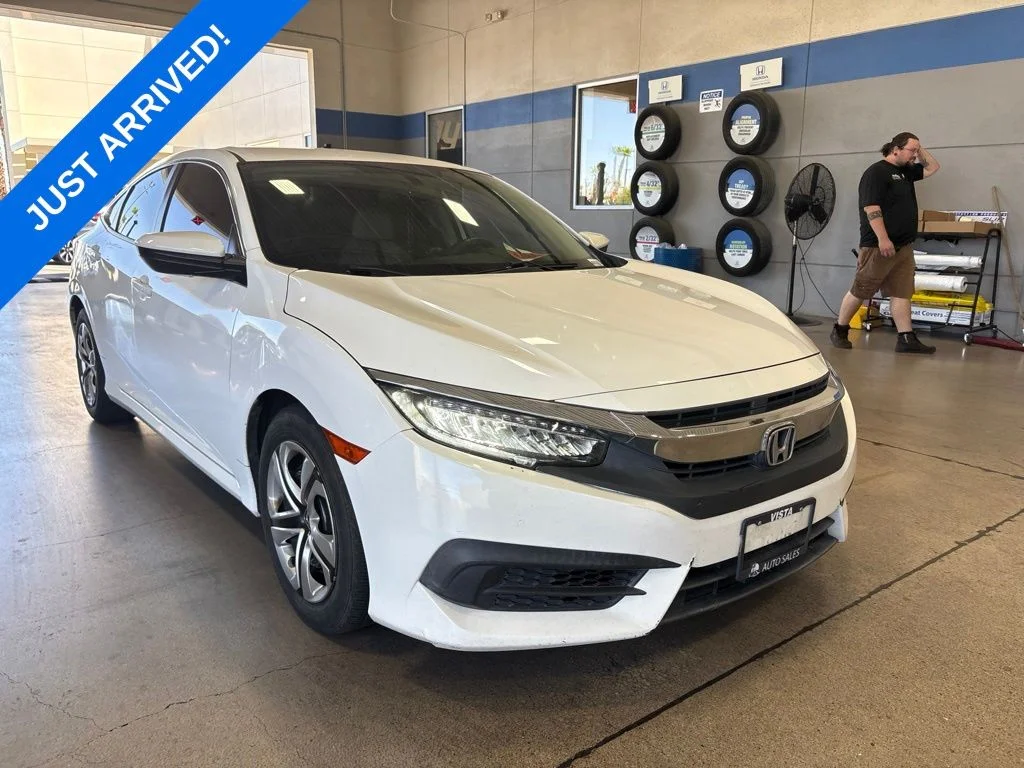 Used 2016 White Orchid Pearl Honda LX image 1