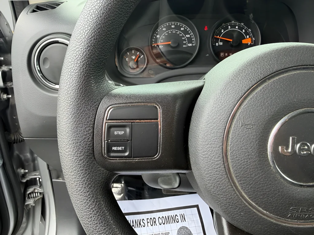Used 2016 Silver Jeep Sport image 11