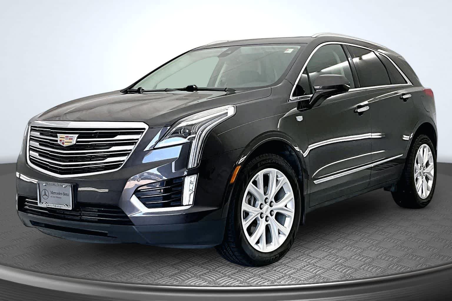 Used 2017 Dark Granite Metallic Cadillac Premium Luxury FWD image 1