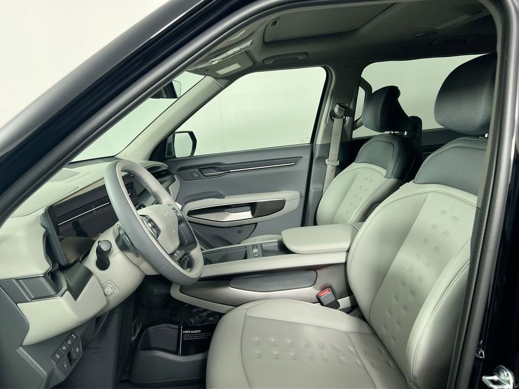 New 2026 Ebony Black Kia Wind AWD image 13