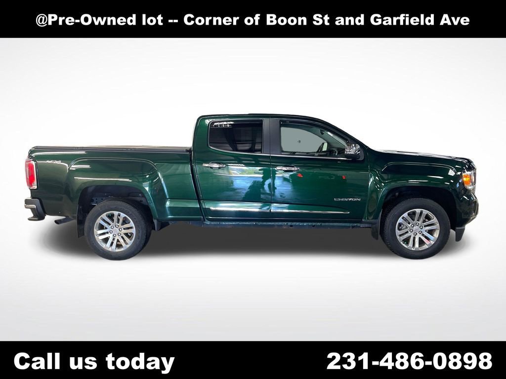 Used 2016 EMERALD GREEN METALLIC GMC 4WD SLT image 6