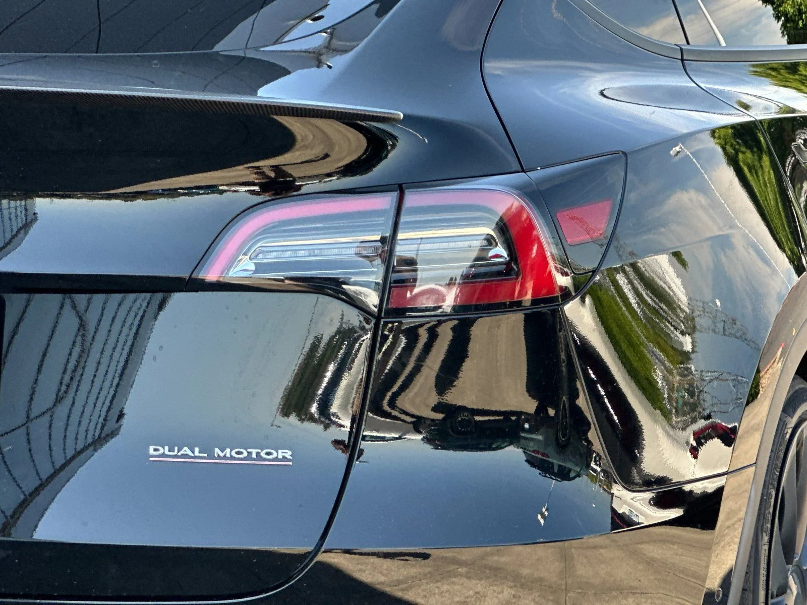 Used 2022 Solid Black Tesla Performance image 25