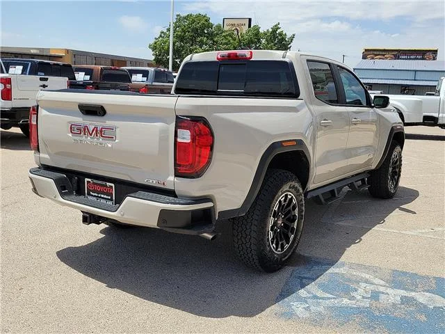 Used 2026 Tan GMC AT4 4x4 Crew Cab 5 ft. box 131 in. WB image 5