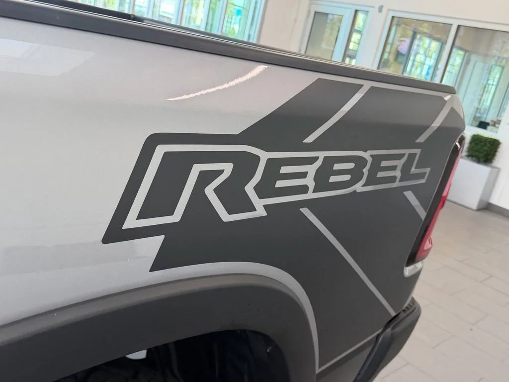 Used 2025 Billet Silver Metallic Clearcoat Ram Rebel image 14