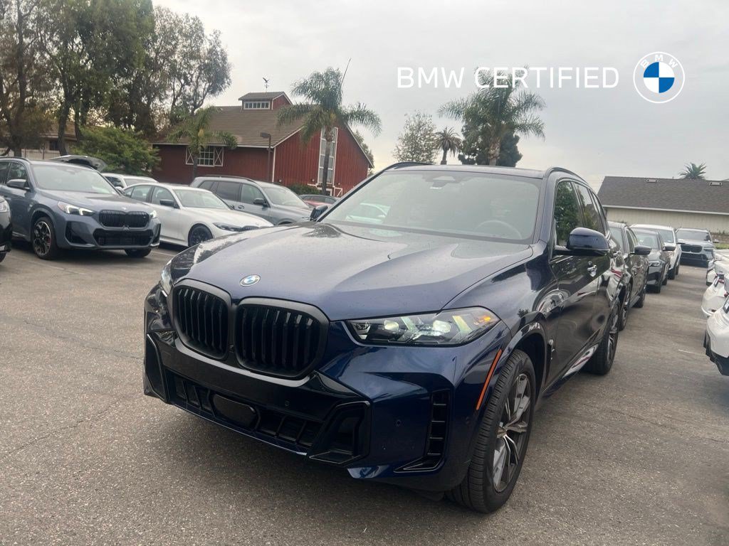 Used 2024 Tanzanite Blue II Metallic BMW sDrive40i image 1