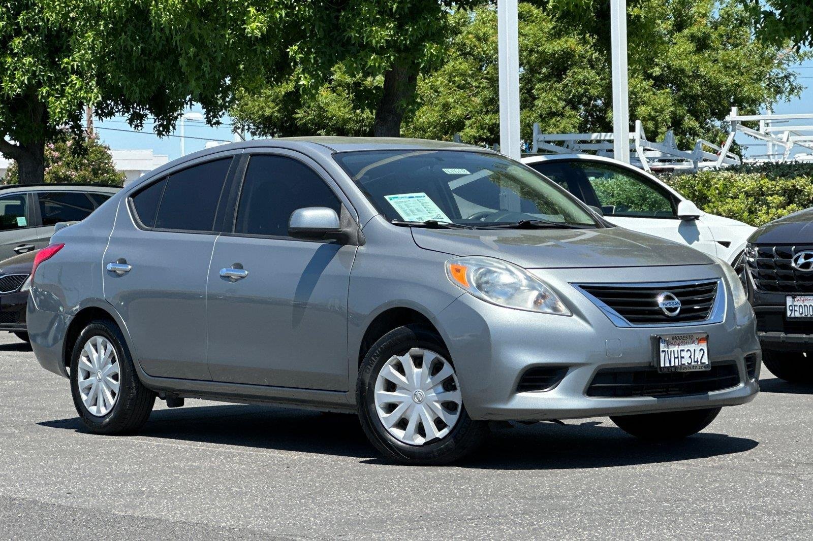 Used 2014 Magnetic Gray Nissan SV image 1