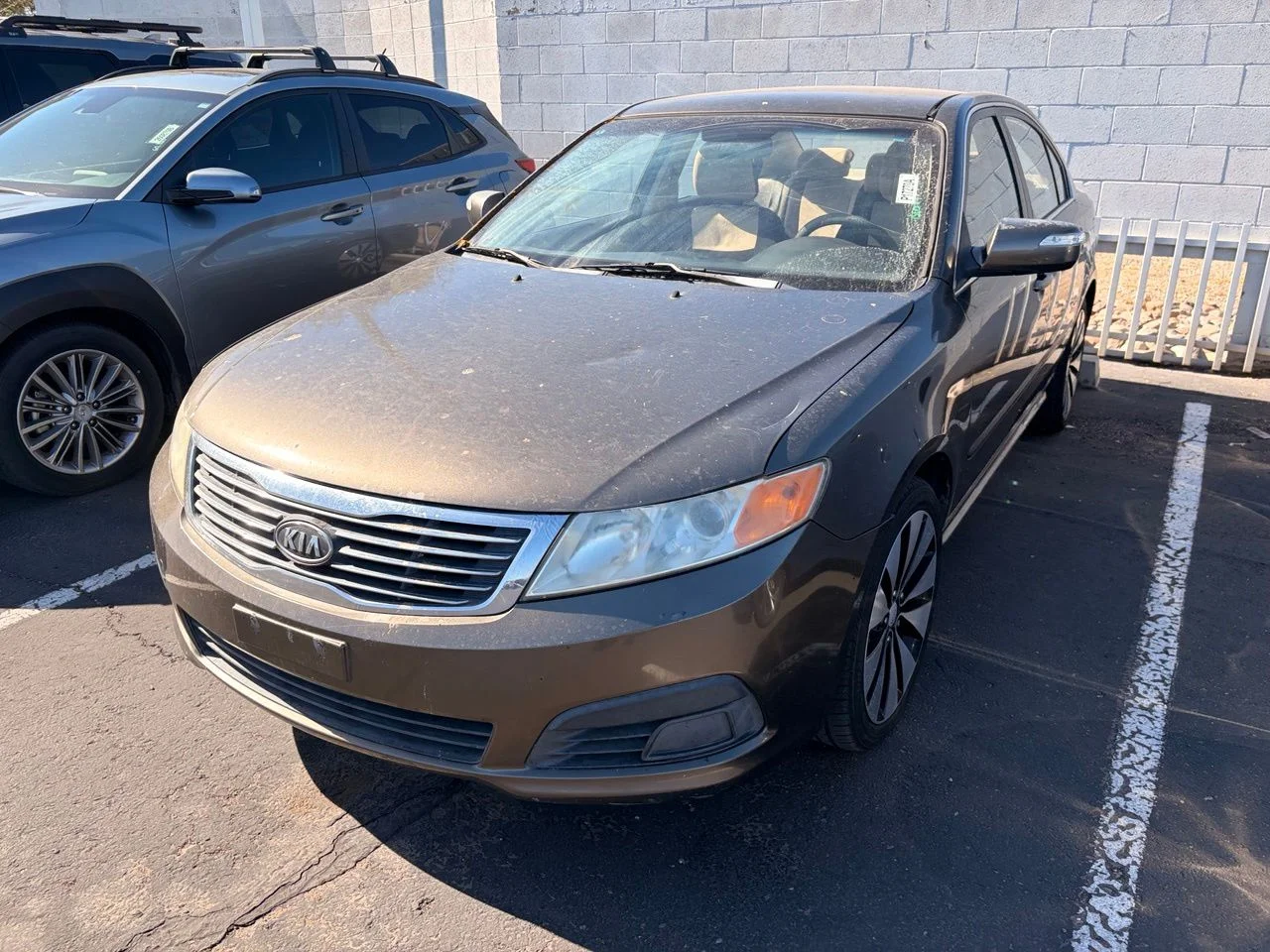 Used 2010 Metal Bronze Kia LX image 1