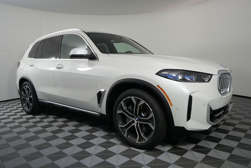 Used 2026 Mineral White Metallic BMW xDrive50e image 9