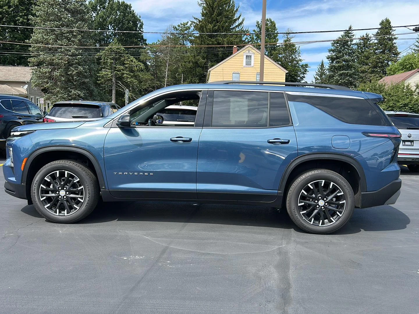 Used 2025 Lakeshore Blue Metallic Chevrolet AWD LT image 4