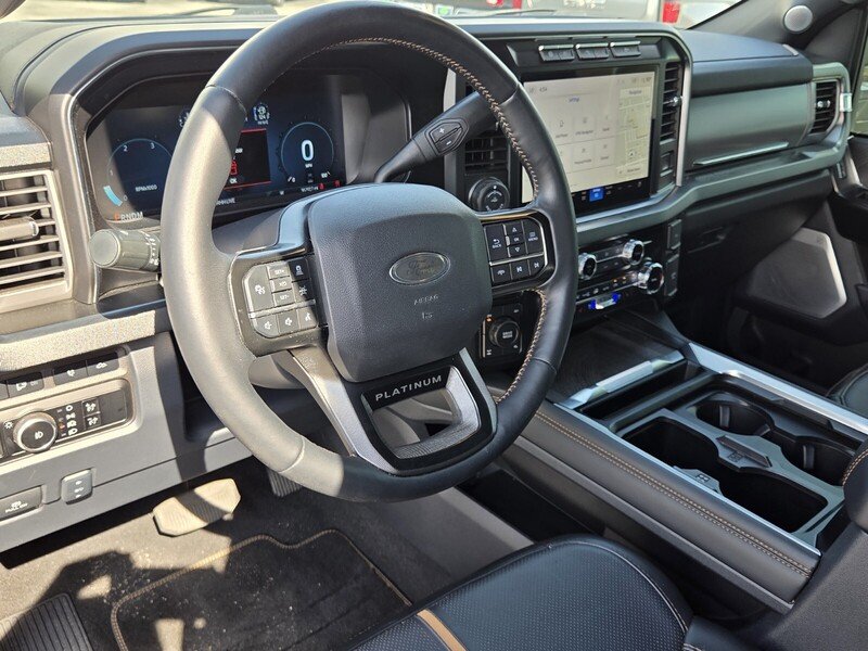 Used 2024 Black Metallic FORD PLATINUM 4WD CREW CAB 6.75