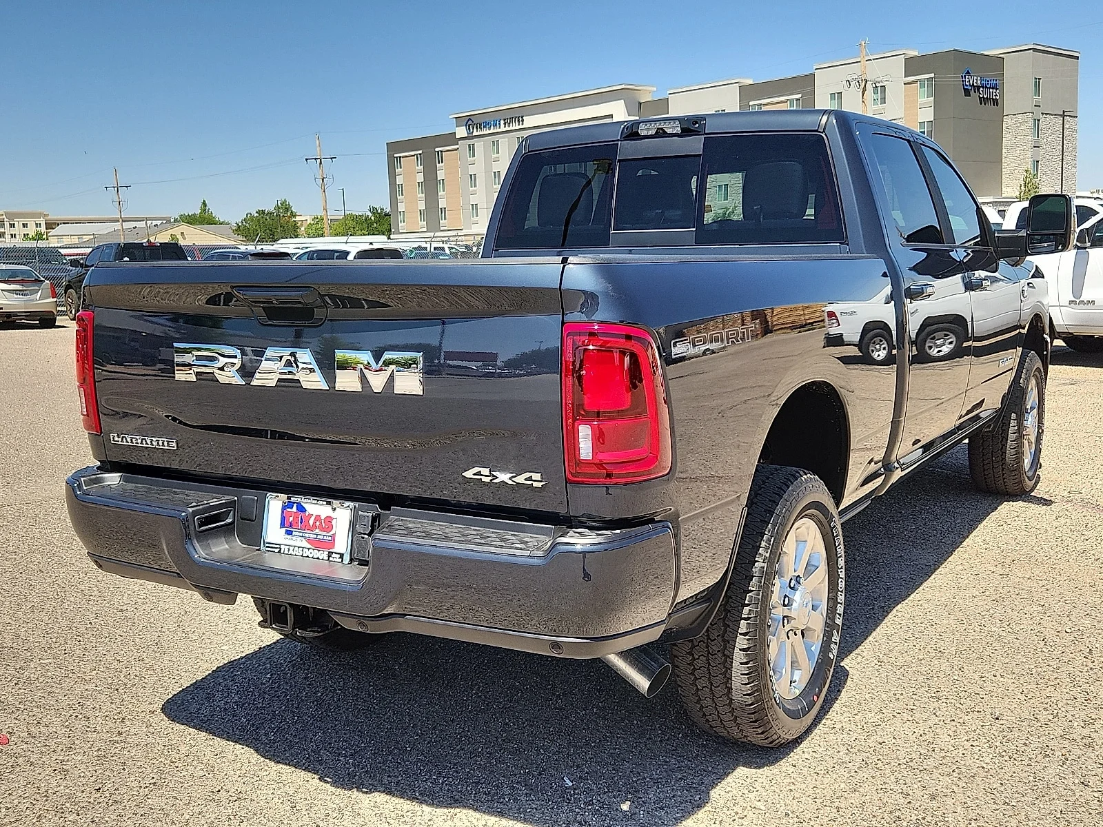 New 2026 Forged Blue Ram LARAMIE CREW CAB 4X4 6