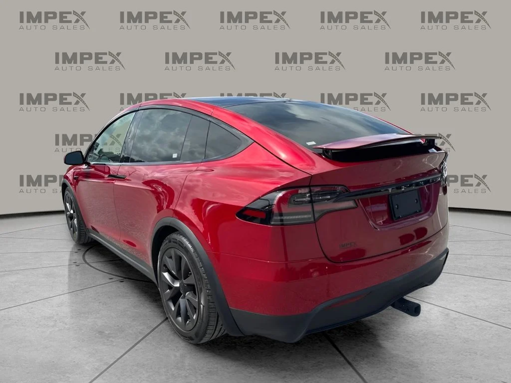 Used 2023 Red Tesla Base image 2