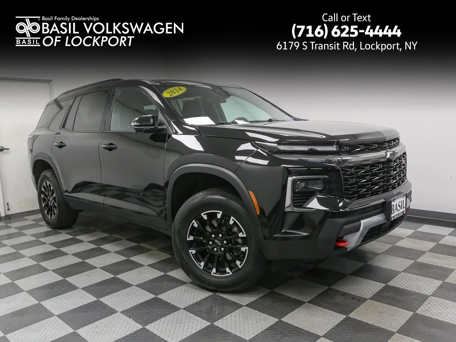 Used 2024 Mosaic Black Metallic Chevrolet AWD Z71 image 1