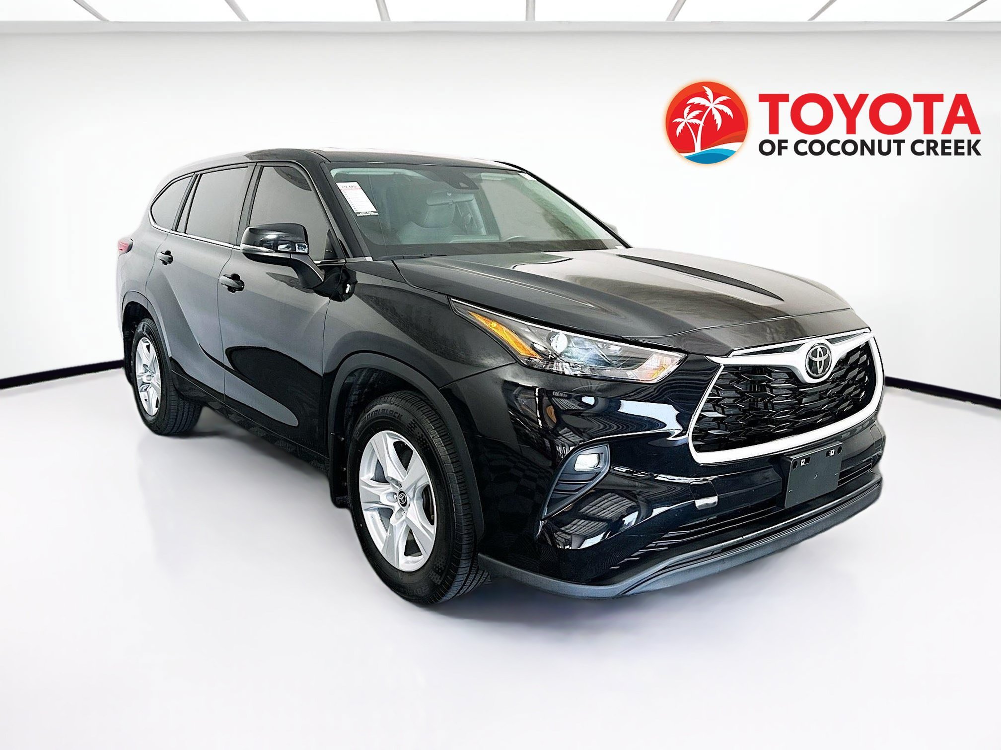 Used 2023 Midnight Black Metallic Toyota LE image 1