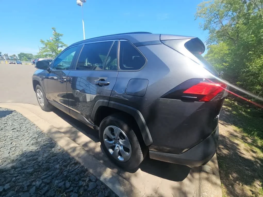 Used 2021 Magnetic Gray Metallic Toyota LE image 6