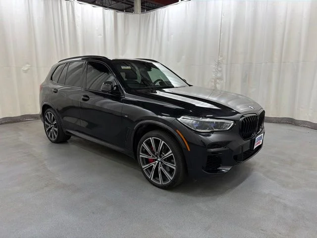 Used 2022 Black BMW M50i image 1