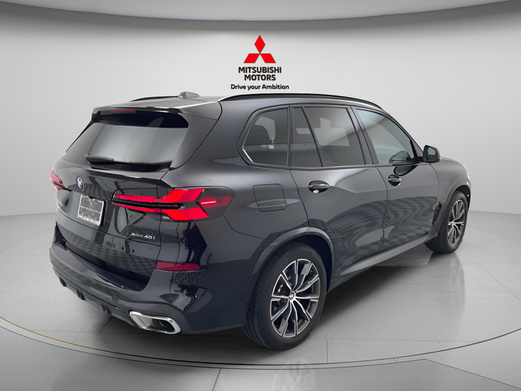 Used 2026 Black Sapphire Metallic BMW xDrive40i M Sport image 4