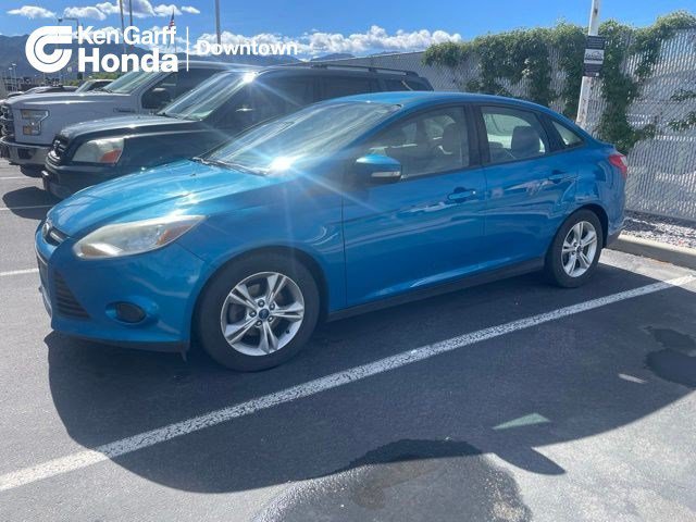 Used 2014 Blue Candy Tinted Clearcoat Ford SE image 1