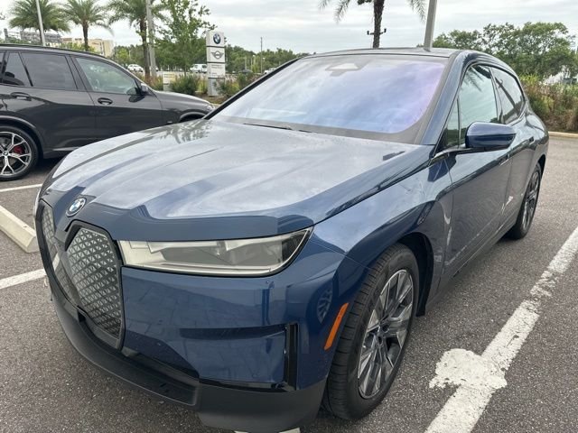 Used 2022 Blue Metallic BMW xDrive50 image 1