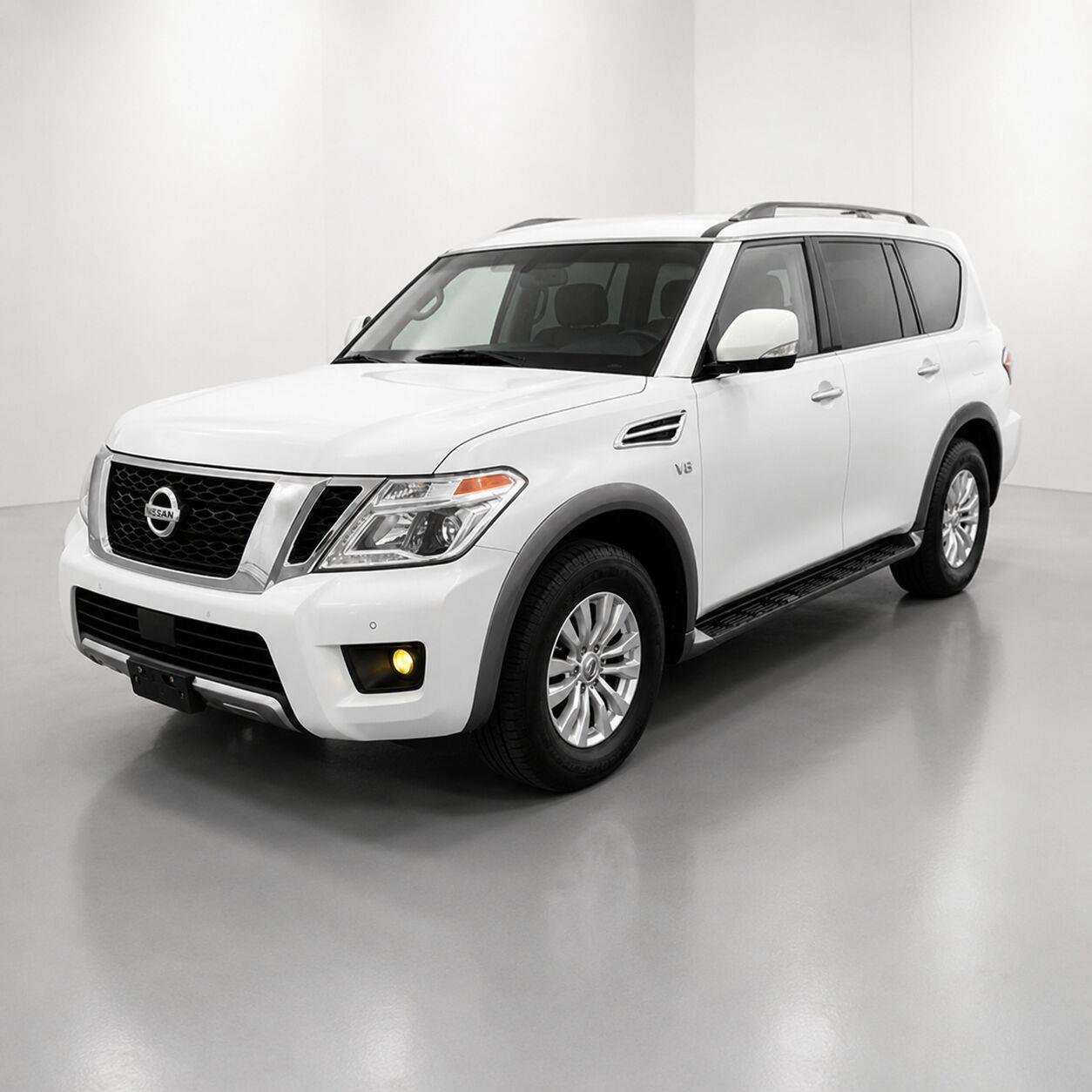 Used 2019 Pearl White Tricoat Nissan SV image 1