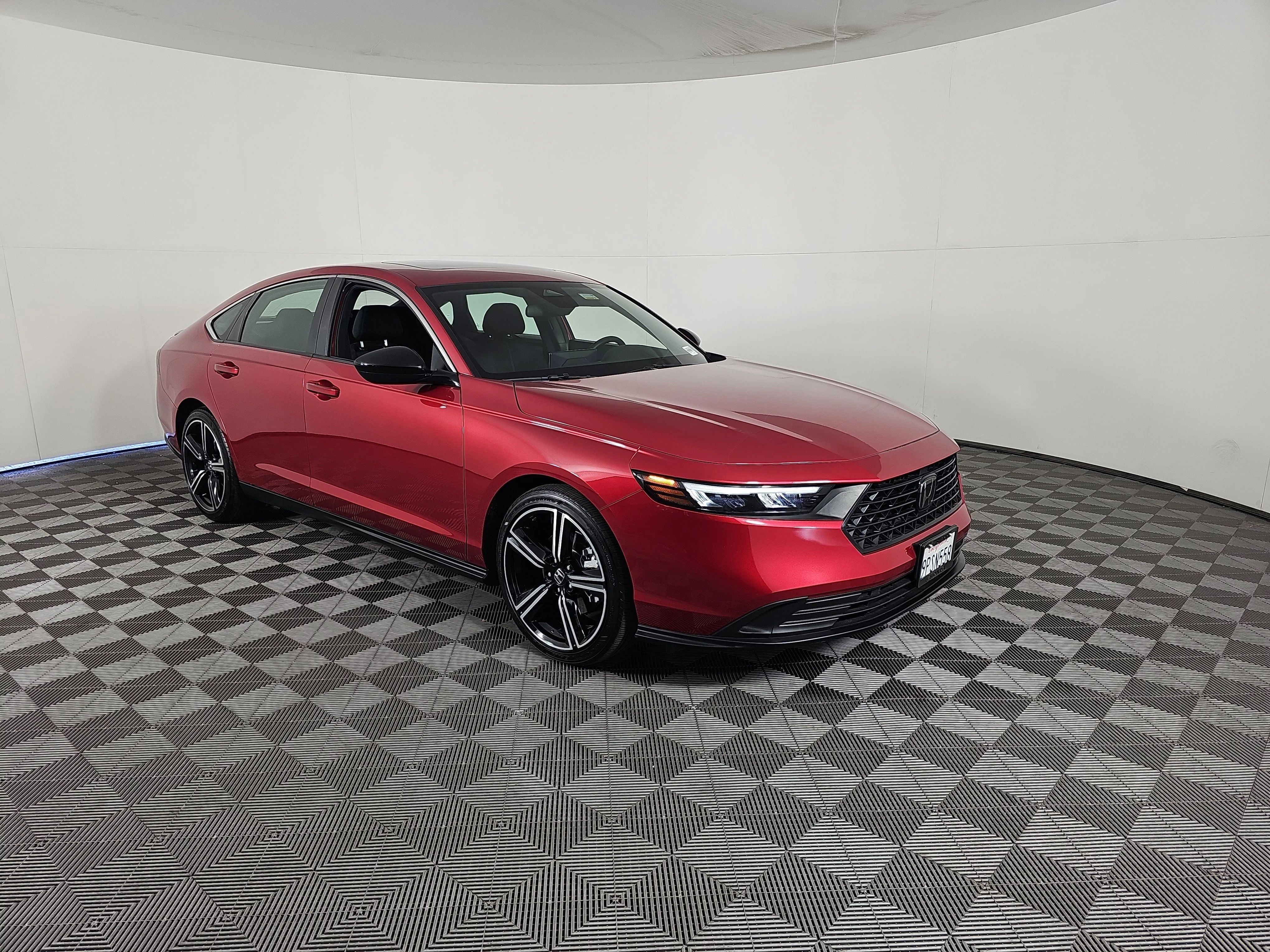 Used 2024 Radiant Red Metallic Honda Sport image 1