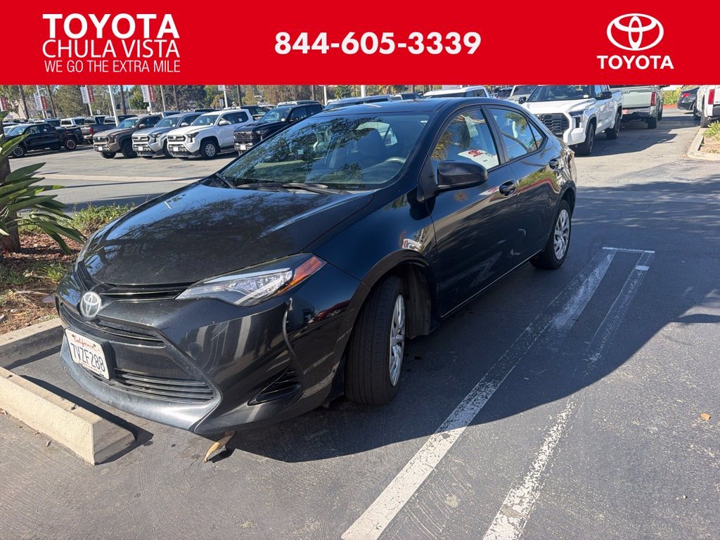 Used 2017 Black Sand Pearl Toyota LE image 1