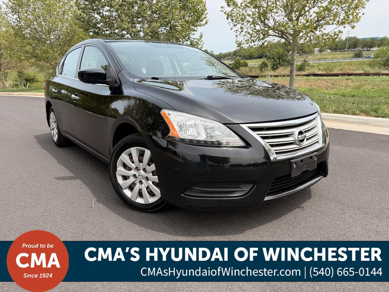 Used 2015 Super Black Nissan S image 1