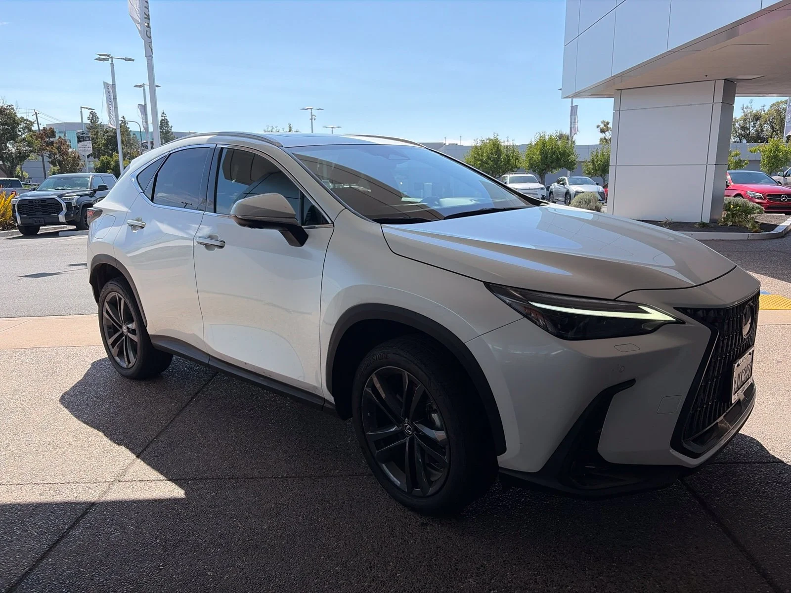 Certified Used 2024 Eminent White Pearl Lexus 450h+ Luxury image 1