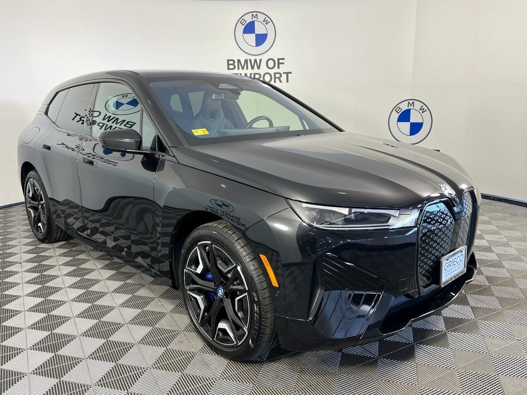 Used 2025 Black BMW xDrive50 image 1