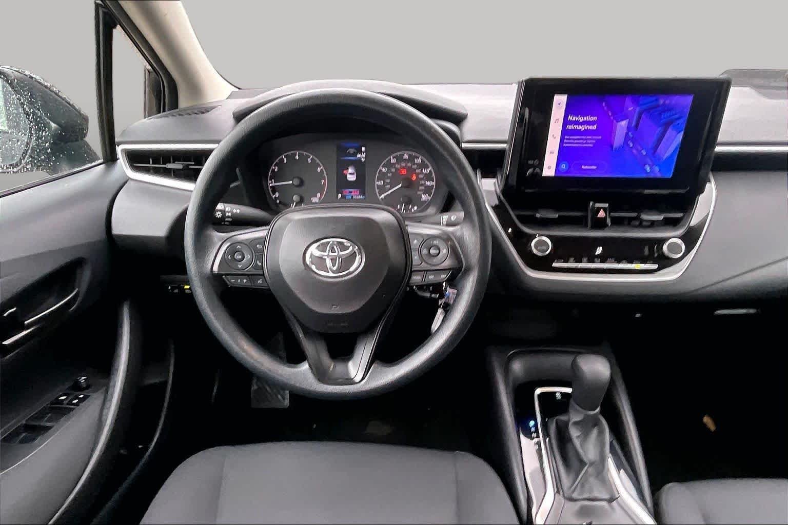 Used 2024 Midnight Black Metallic Toyota LE image 6