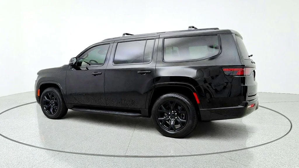Used 2023 Diamond Black Crystal Pearlcoat Jeep Series II Carbide 4x4 w/ Tri-Pane Roof & Captain