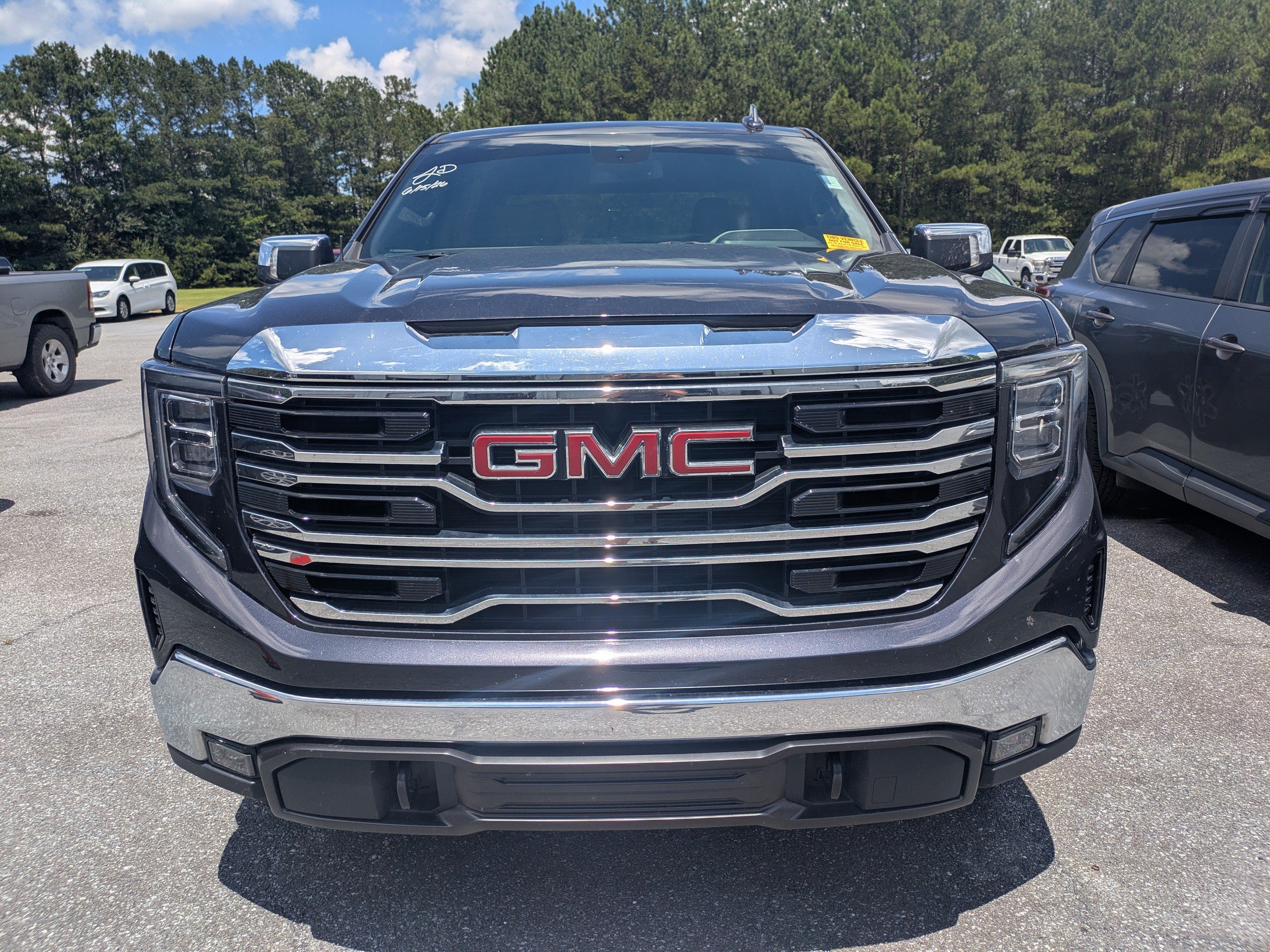 Used 2022 Titanium Rush Metallic GMC SLT image 2