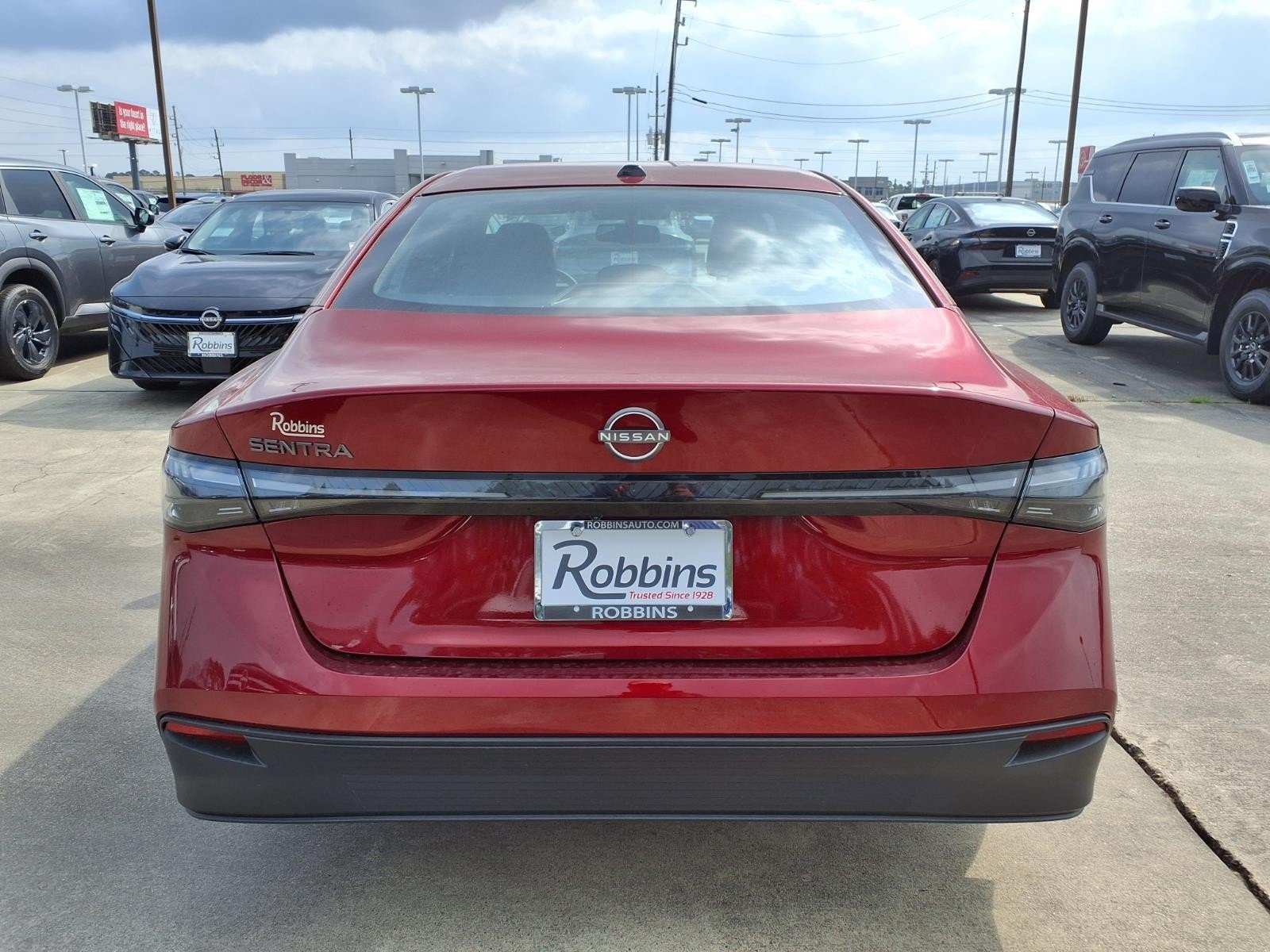 2026 Nissan Sentra SV Red at Robbins Nissan