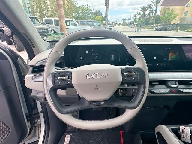 New 2026 Ivory Silver Kia Wind AWD image 11