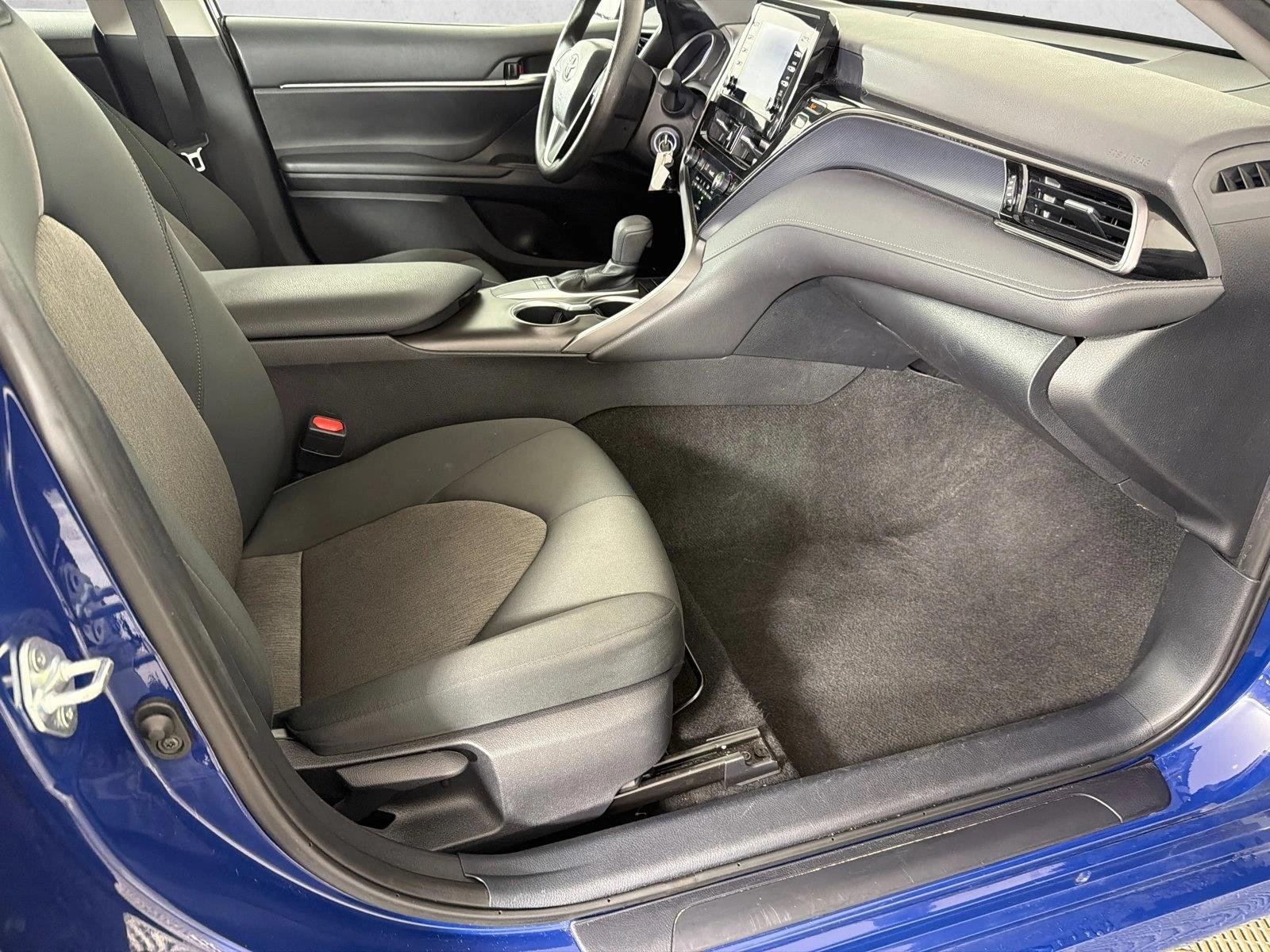 Used 2024 Reservoir Blue Toyota LE image 13
