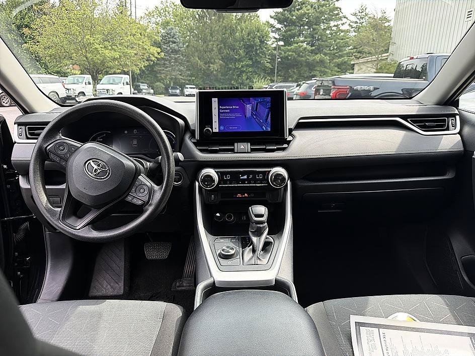 Used 2025 Midnight Black Metallic Toyota Hybrid XLE image 13