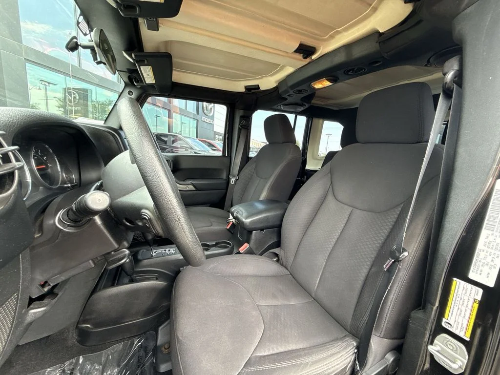 Used 2013 Black Jeep Unlimited Sport image 11