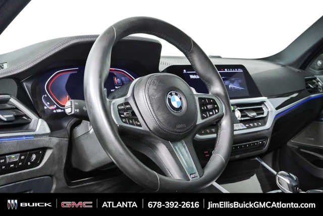 Used 2021 Portimao Blue Metallic BMW 330i image 4