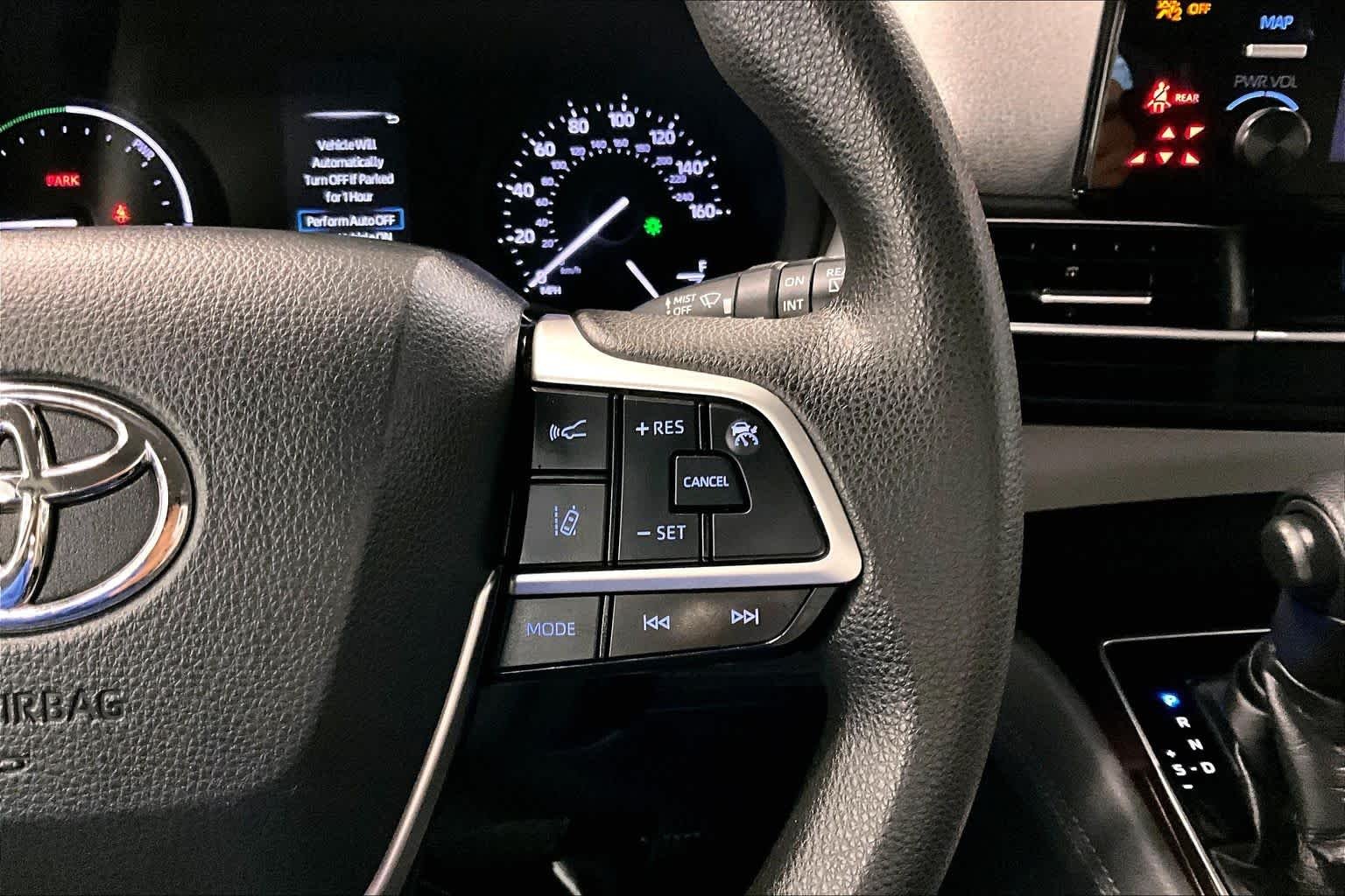 Used 2021 Celestial Silver Metallic Toyota LE image 24