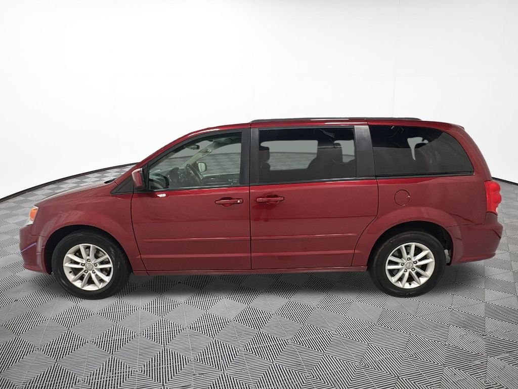 Used 2015 Dodge Grand Caravan SXT with VIN 2C4RDGCG7FR749891 for sale in Eau Claire, WI