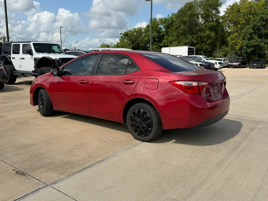 Used 2017 Barcelona Red Metallic Toyota LE image 3