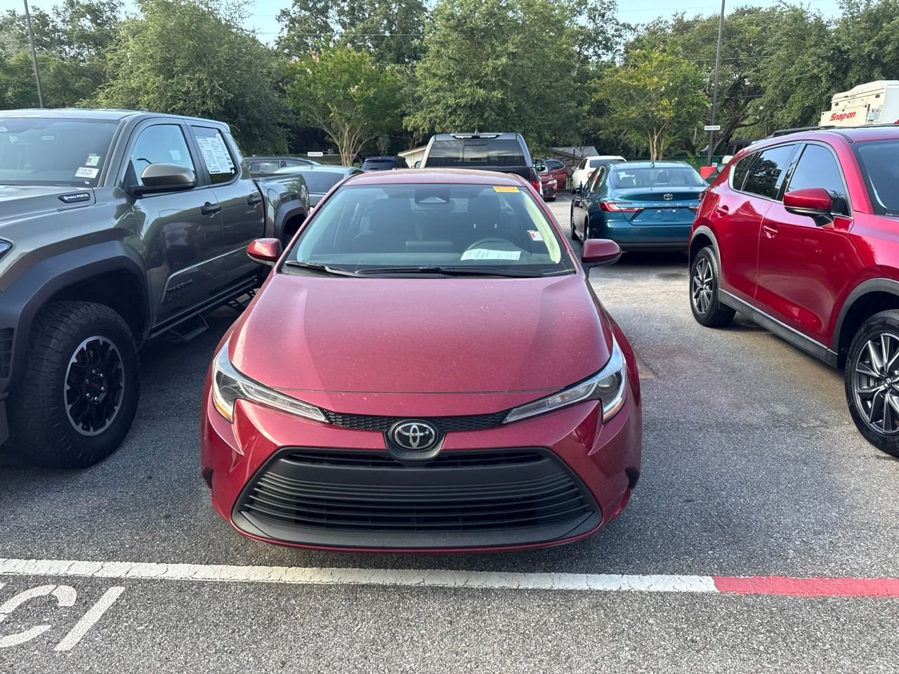 Used 2024 Red Toyota LE image 2