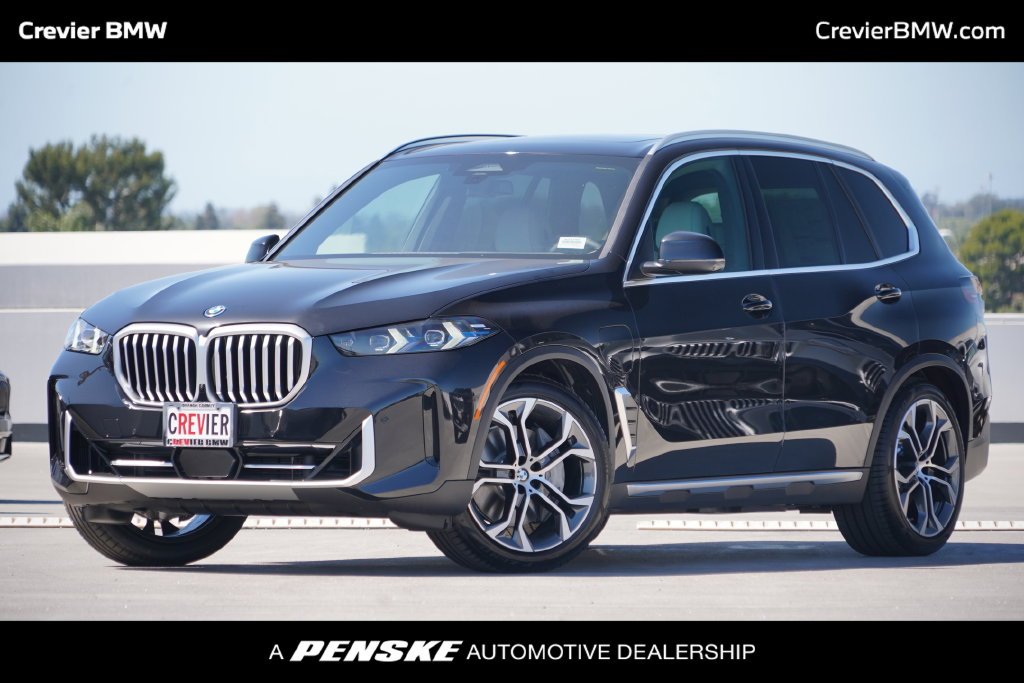 New 2026 Black Sapphire Metallic BMW xDrive50e image 1