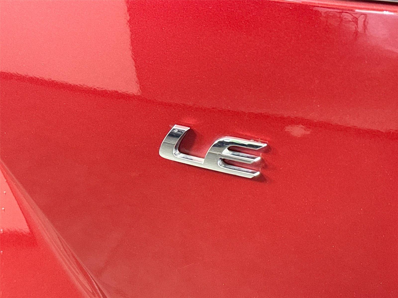 Used 2024 Barcelona Red Metallic Toyota LE image 14