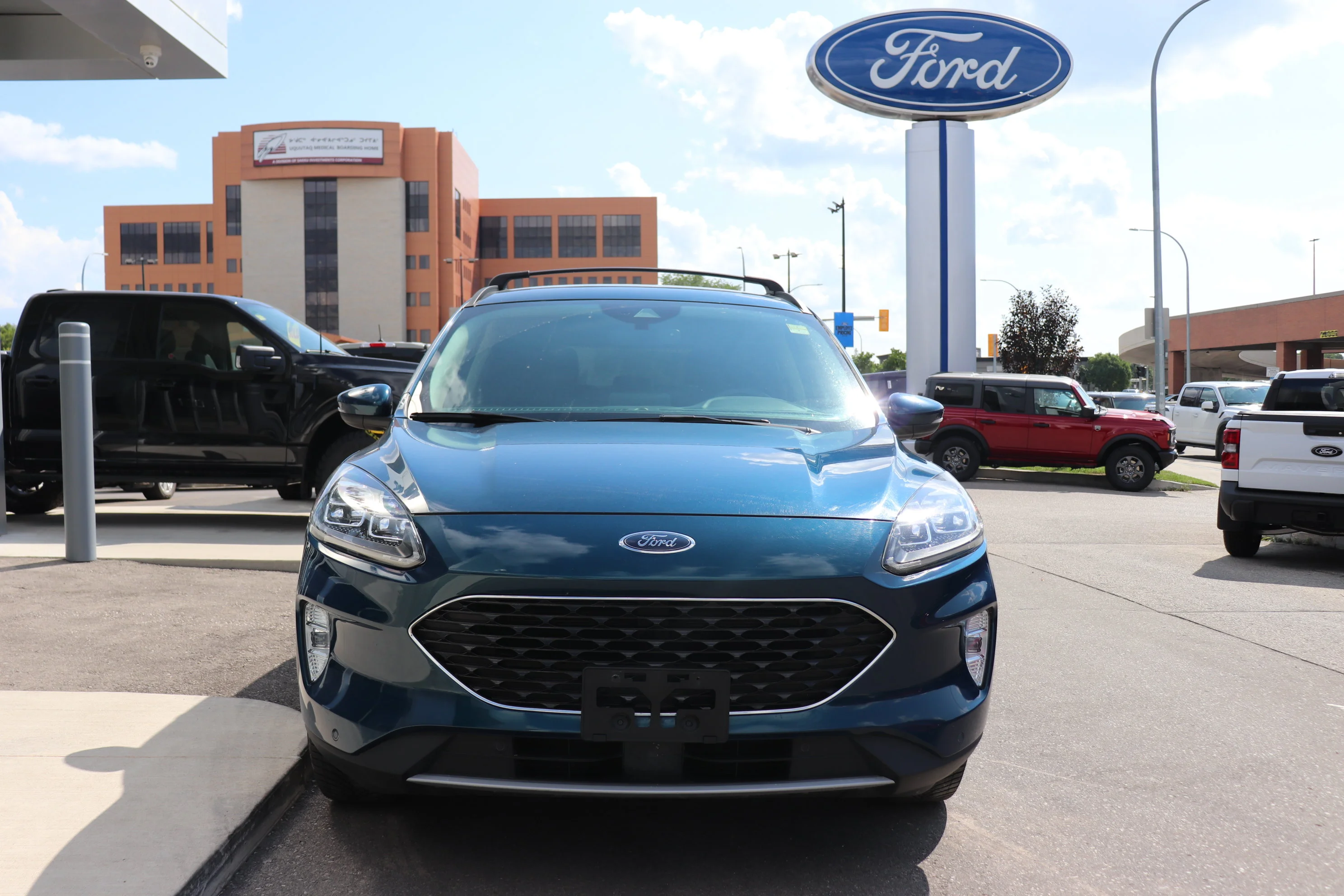 Certified Used 2020 Blue Ford Titanium Hybrid AWD image 2