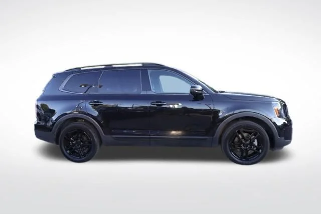 Used 2025 Black Kia EX X-Line image 15