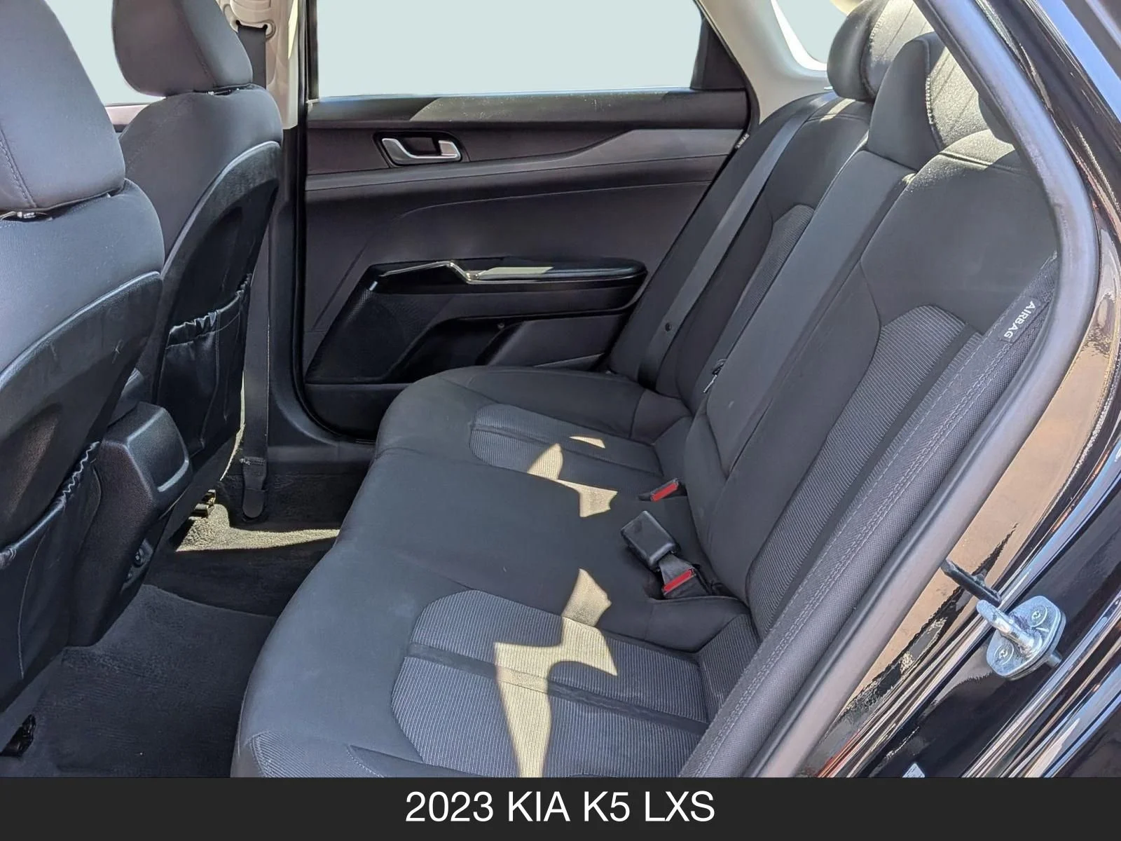 Used 2023 Ebony Black Kia LXS image 15