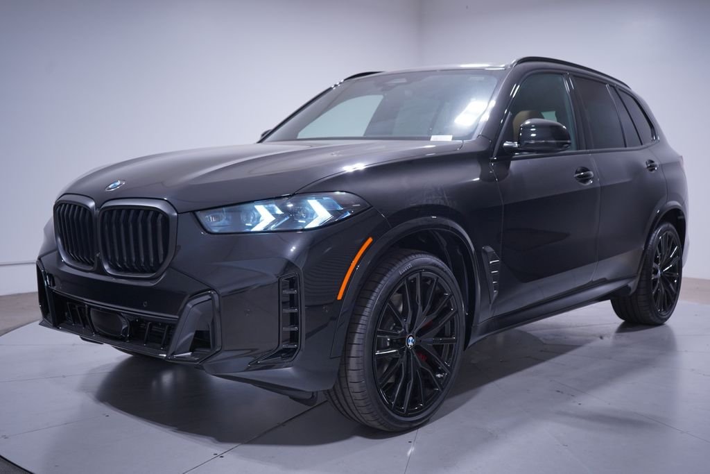 New 2026 Black Sapphire Metallic BMW sDrive40i image 1