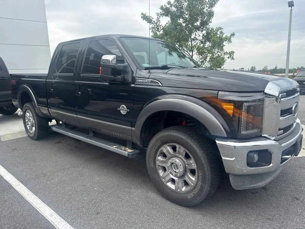 Used 2014 Tuxedo Black Metallic Ford Lariat image 1