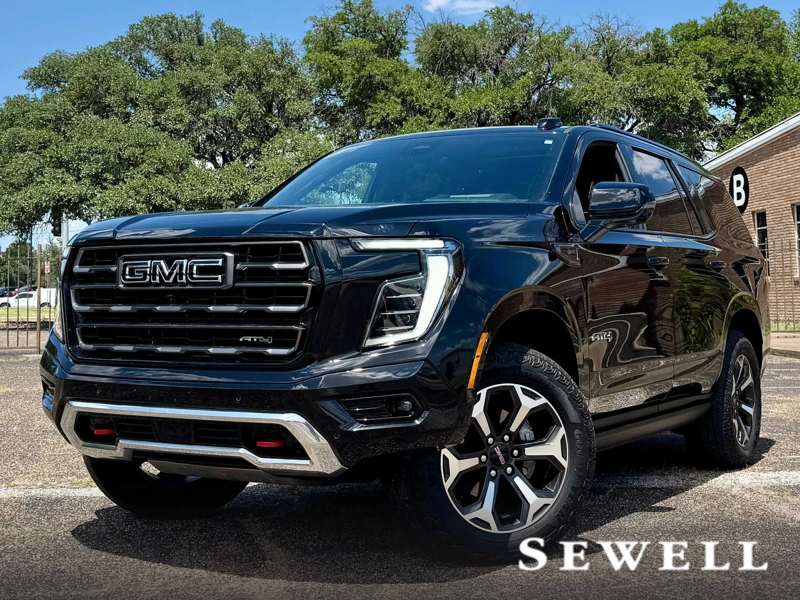 Certified Used 2025 Onyx Black GMC AT4 Ultimate image 1